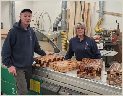 Owners Ben and Carol in wood shop